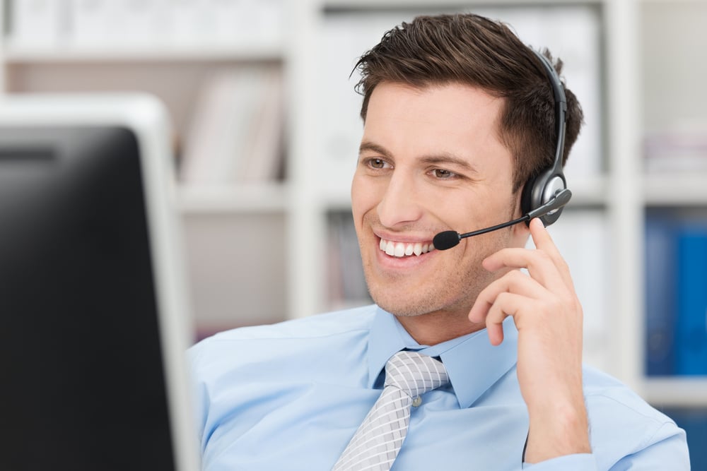 call center agent on computer with headphone